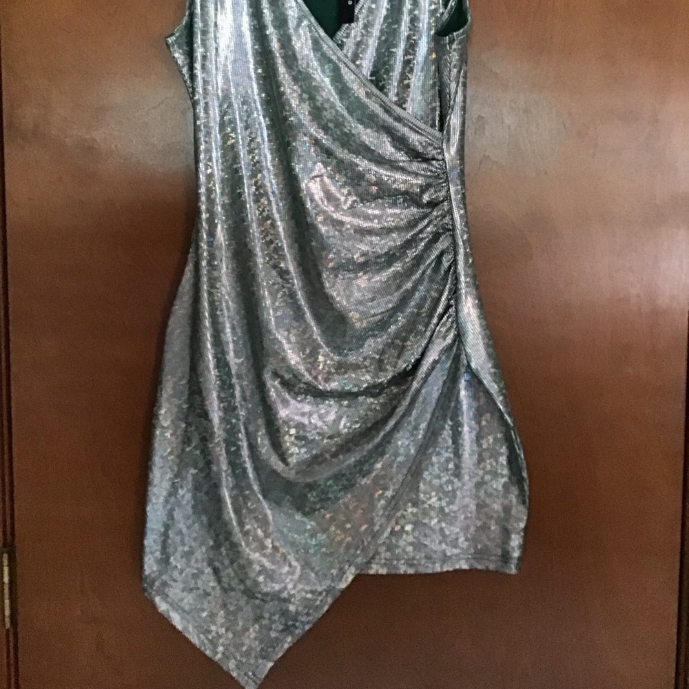 Woman’s sleeveless party dress/top. NWT